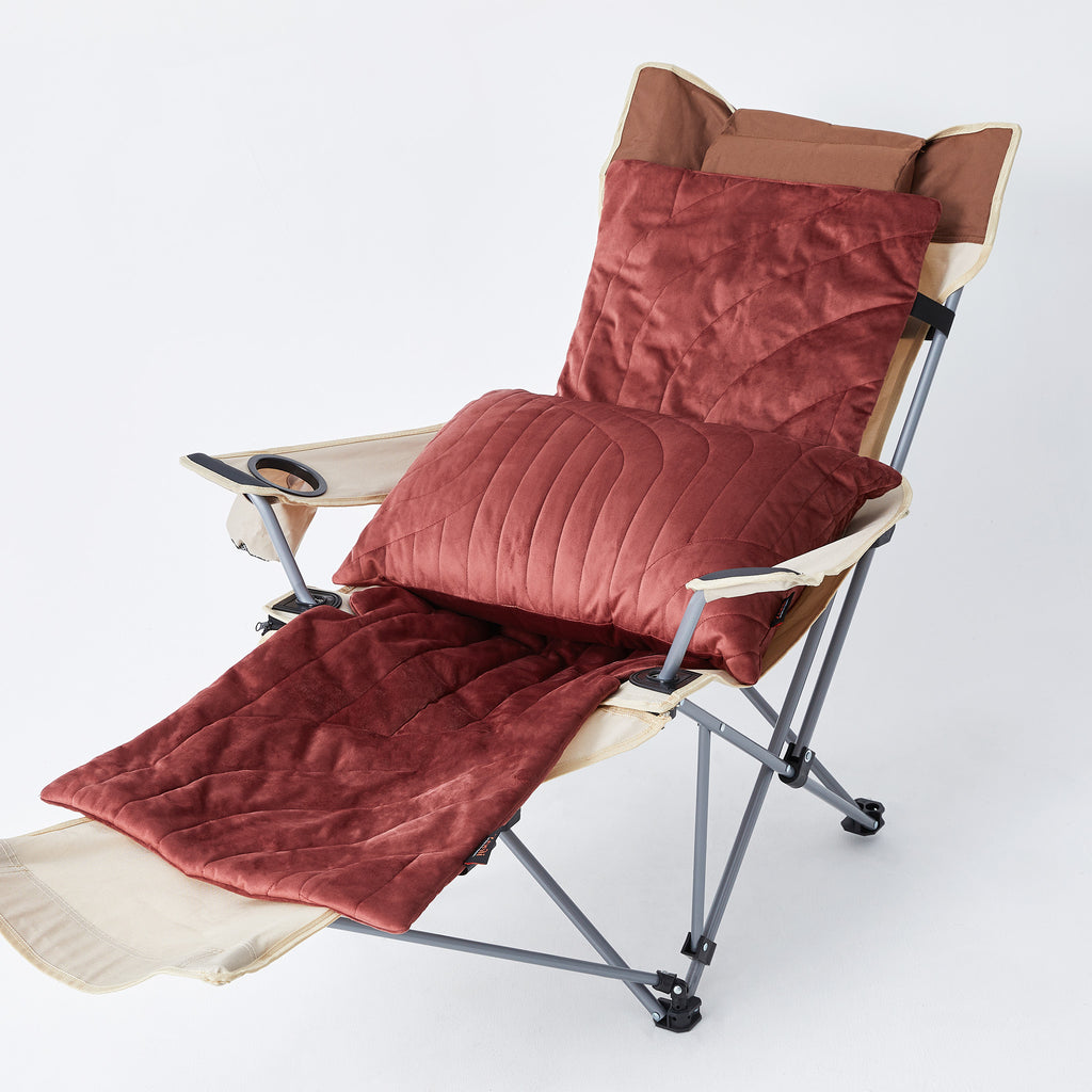 heated pad and pillow on outdoor chair