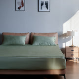 Green Pillowcase on Bed