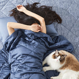 sleep with a cooling comforter and a cute cat